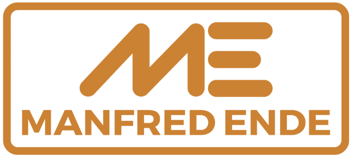 Logo der Manfred Ende GmbH mit den Initialen „ME“ und dem ausgeschriebenen Unternehmensnamen in orangefarbener Gestaltung auf schwarzem Hintergrund.